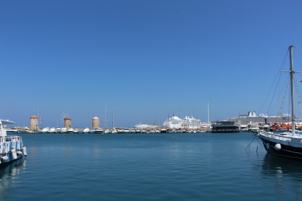 Windmills and cruise ships at the Mandraki harbour in Rhodes.